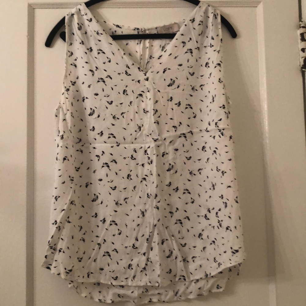 White sleeveless blouse